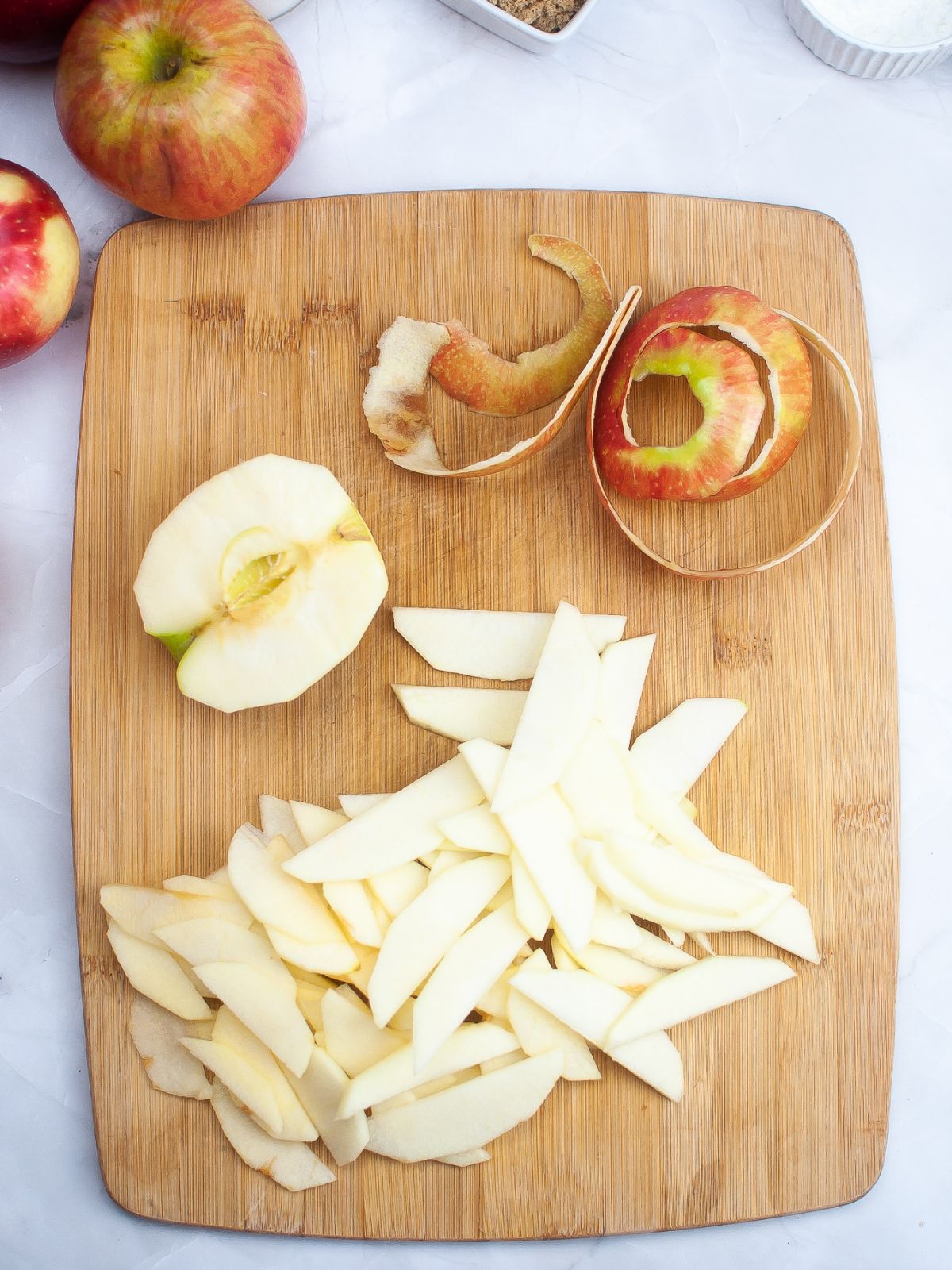 apple slices on cutting board.