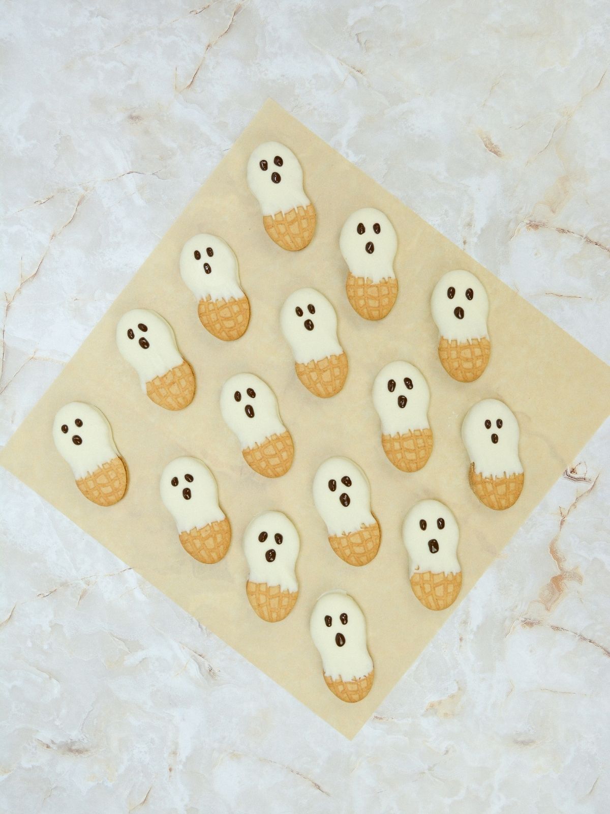 Nutter Butter cookies decorated as ghosts.
