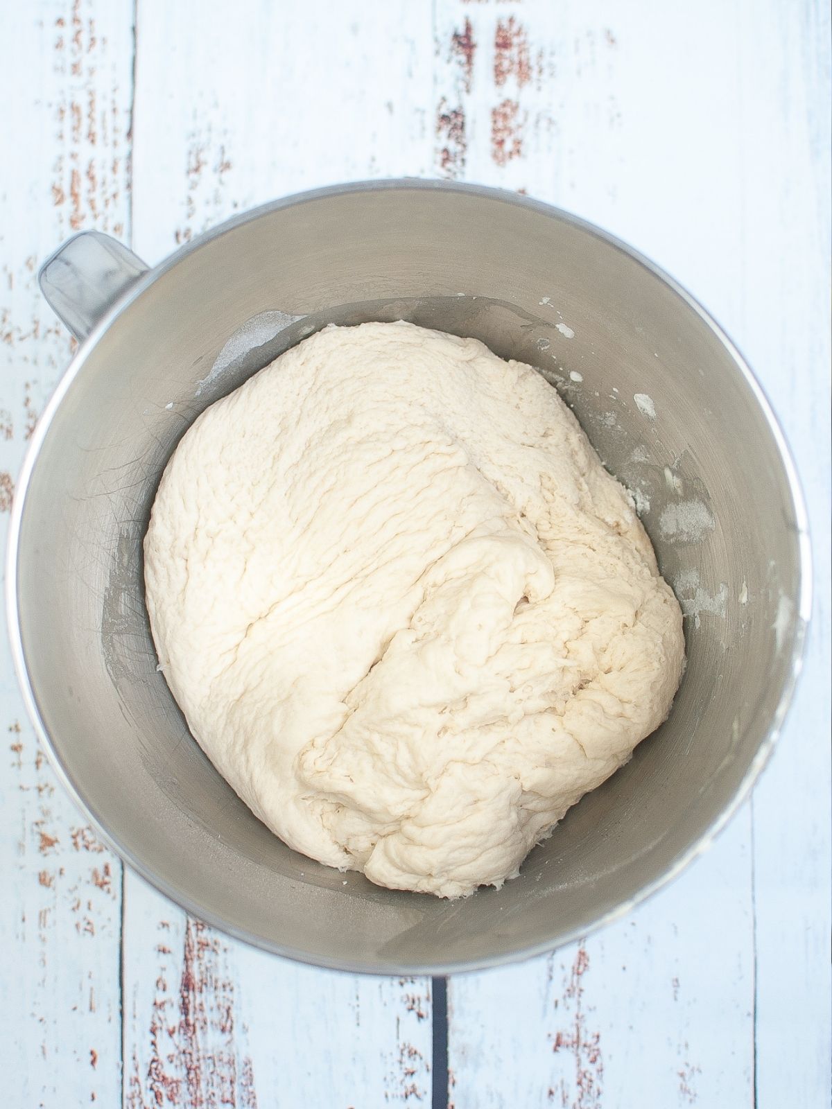 Flatbread dough with yeast after first rise.