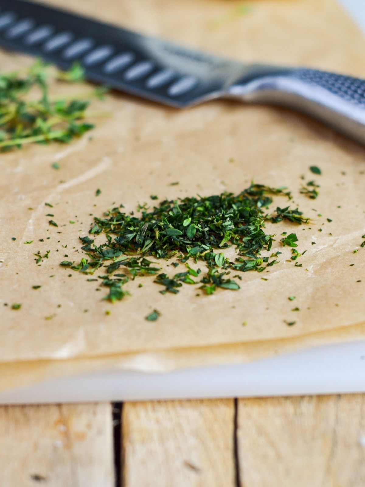chopped rosemary on parchment paper.