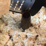 grated Parmesan cheese on top of monkey bread.