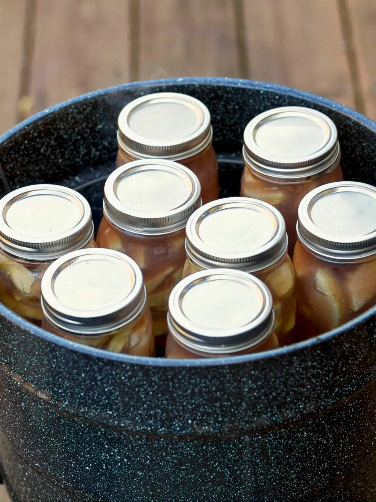 mason jars in canning pot.