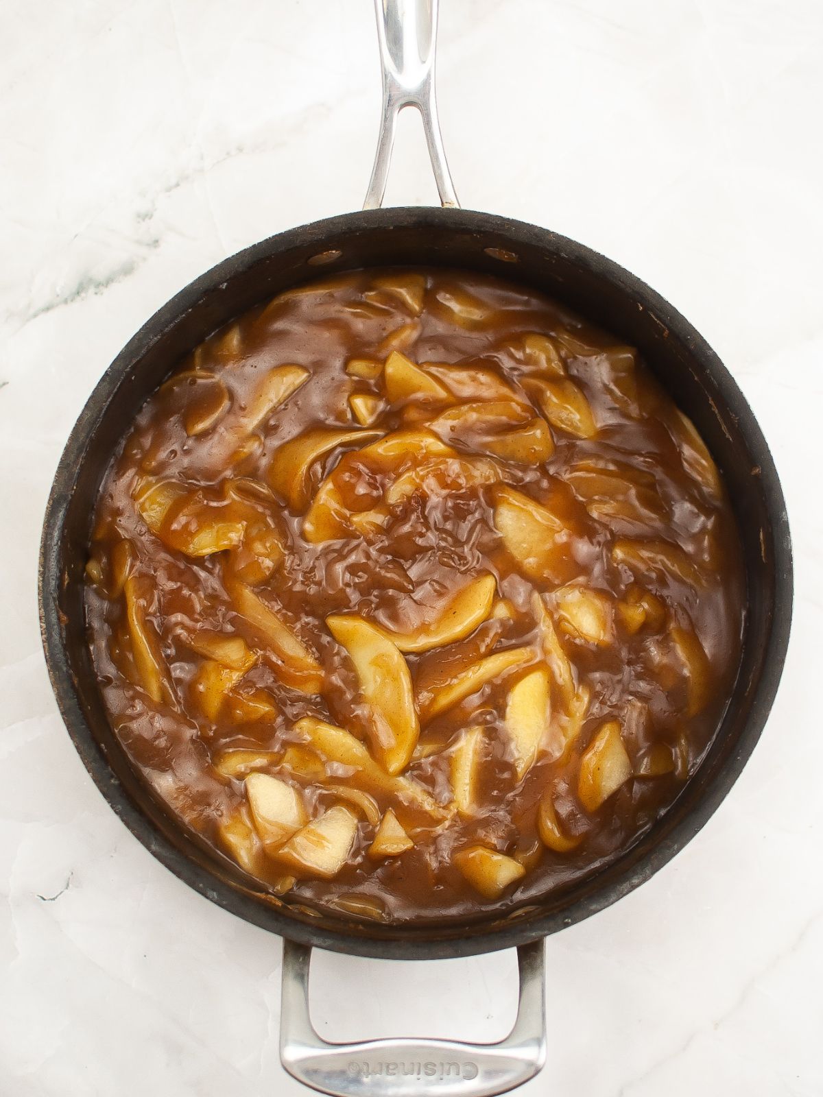 thickened apple slices in skillet.
