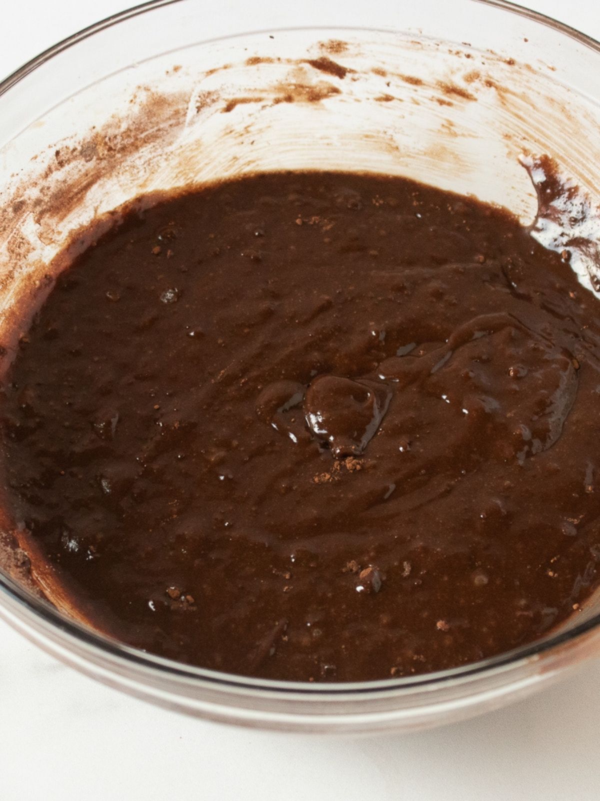 chocolate brownie mix in glass bowl.
