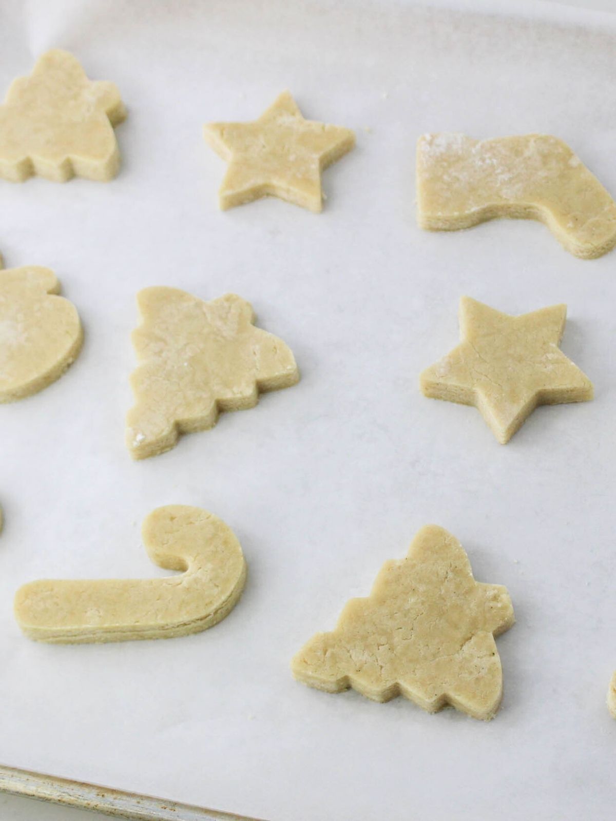 cut out cookies on baking tray.