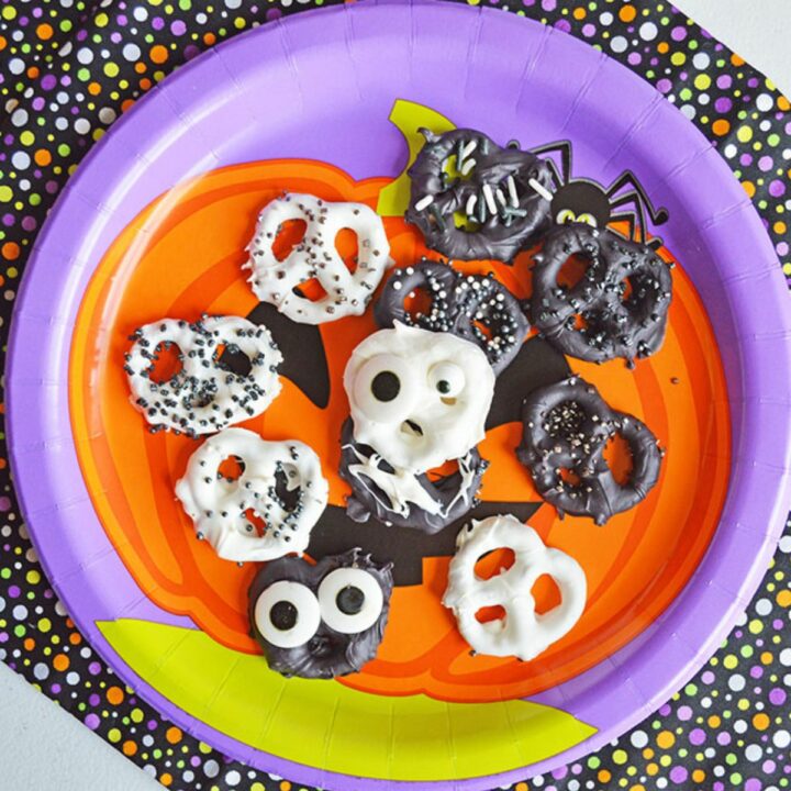 Halloween pretzels with spooky eyes and sprinkles.