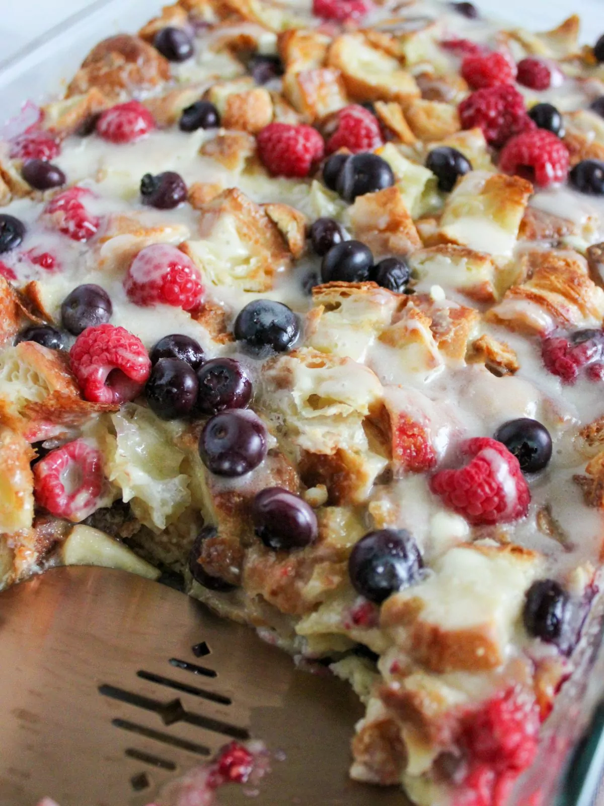 baked breakfast casserole with serving utensil.