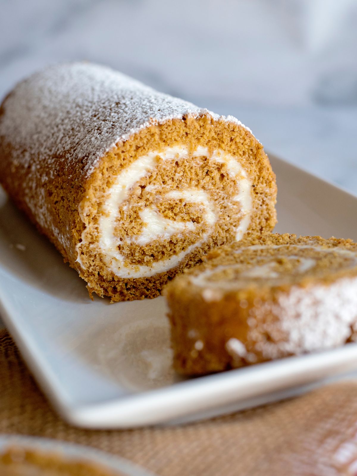 closeup of pumpkin roll sliced.