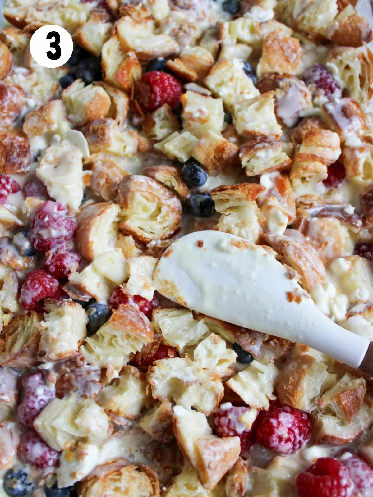 croissants and fruit mixed with egg custard.