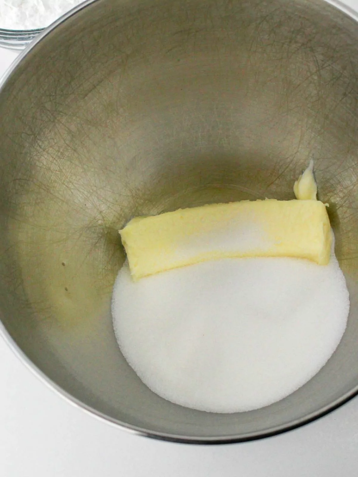 Butter and granulated sugar in mixing bowl.