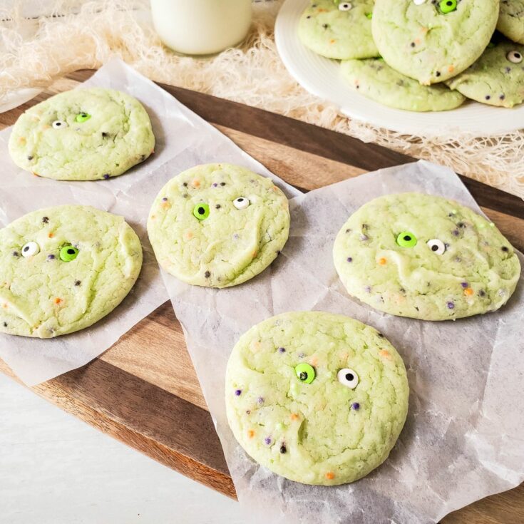 green cookies with colorful sprinkles and eyeball sprinkles