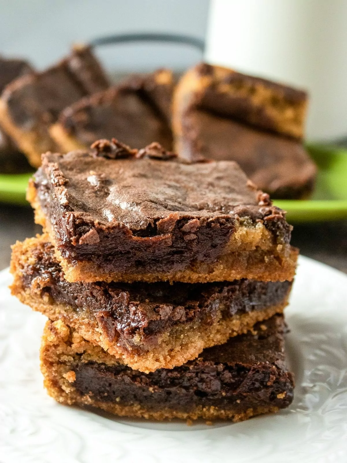 stacked peanut butter brownies on plate.