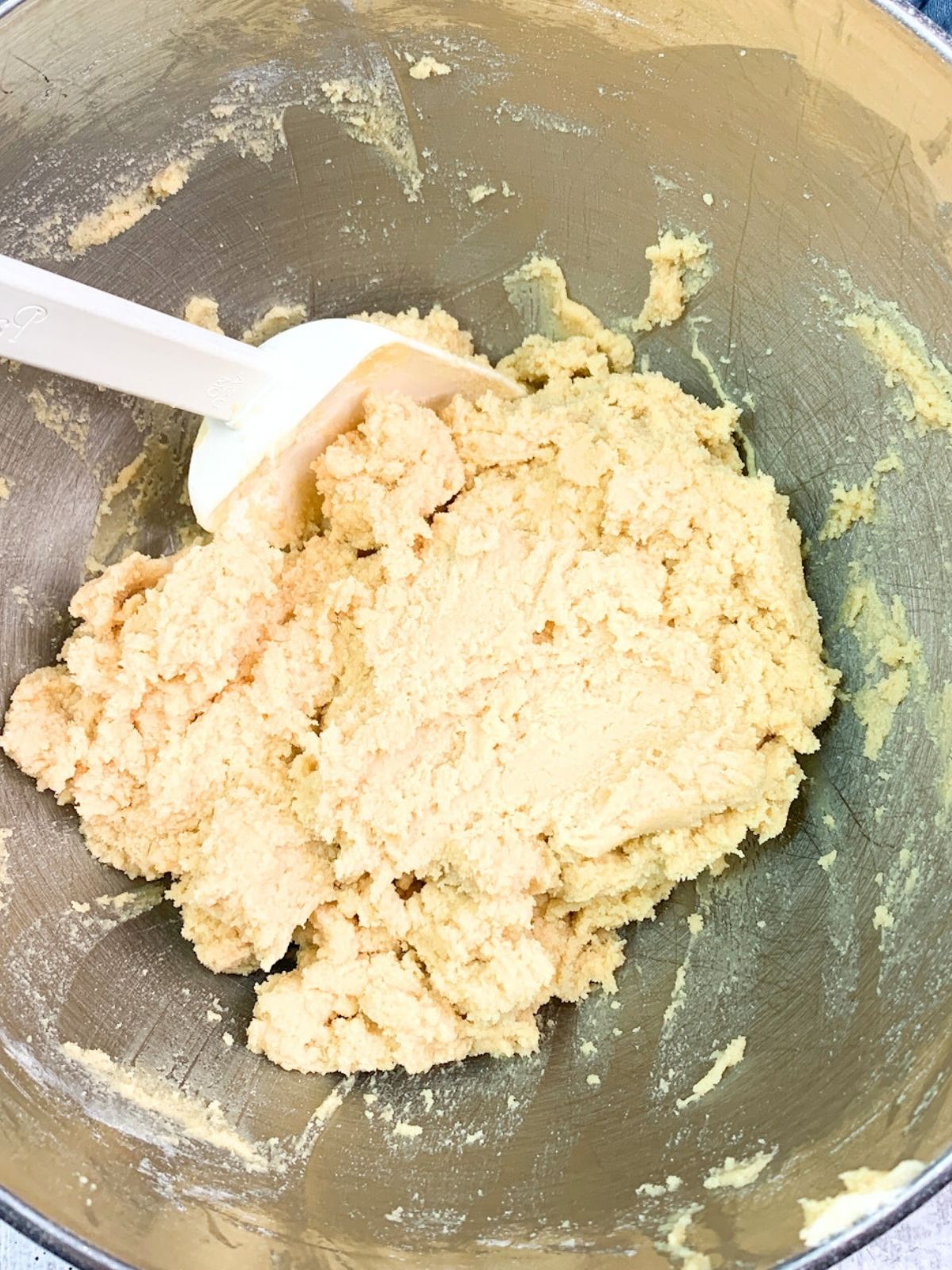 raw cookie dough combined in mixing bowl.