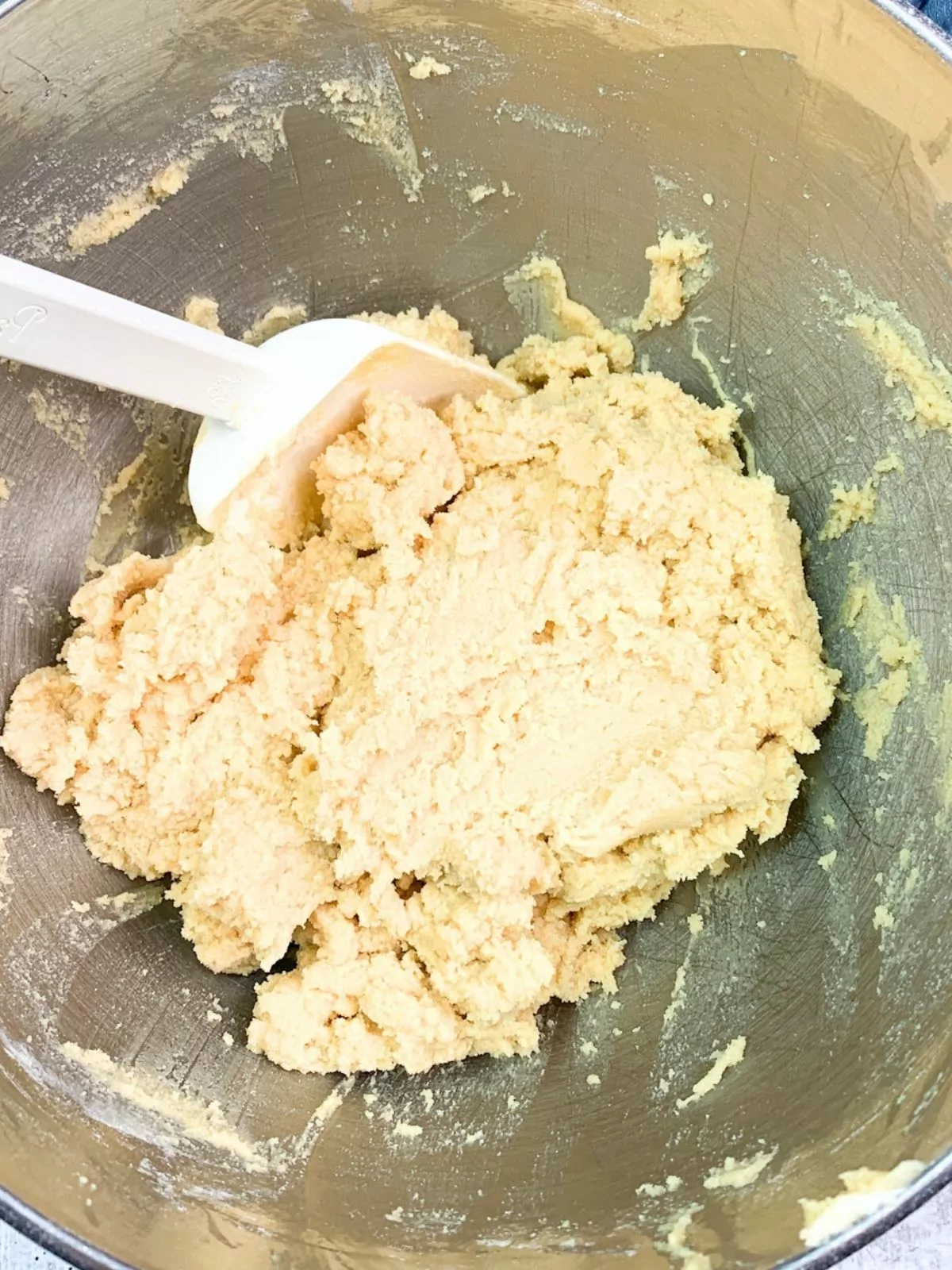 raw cookie dough combined in mixing bowl.
