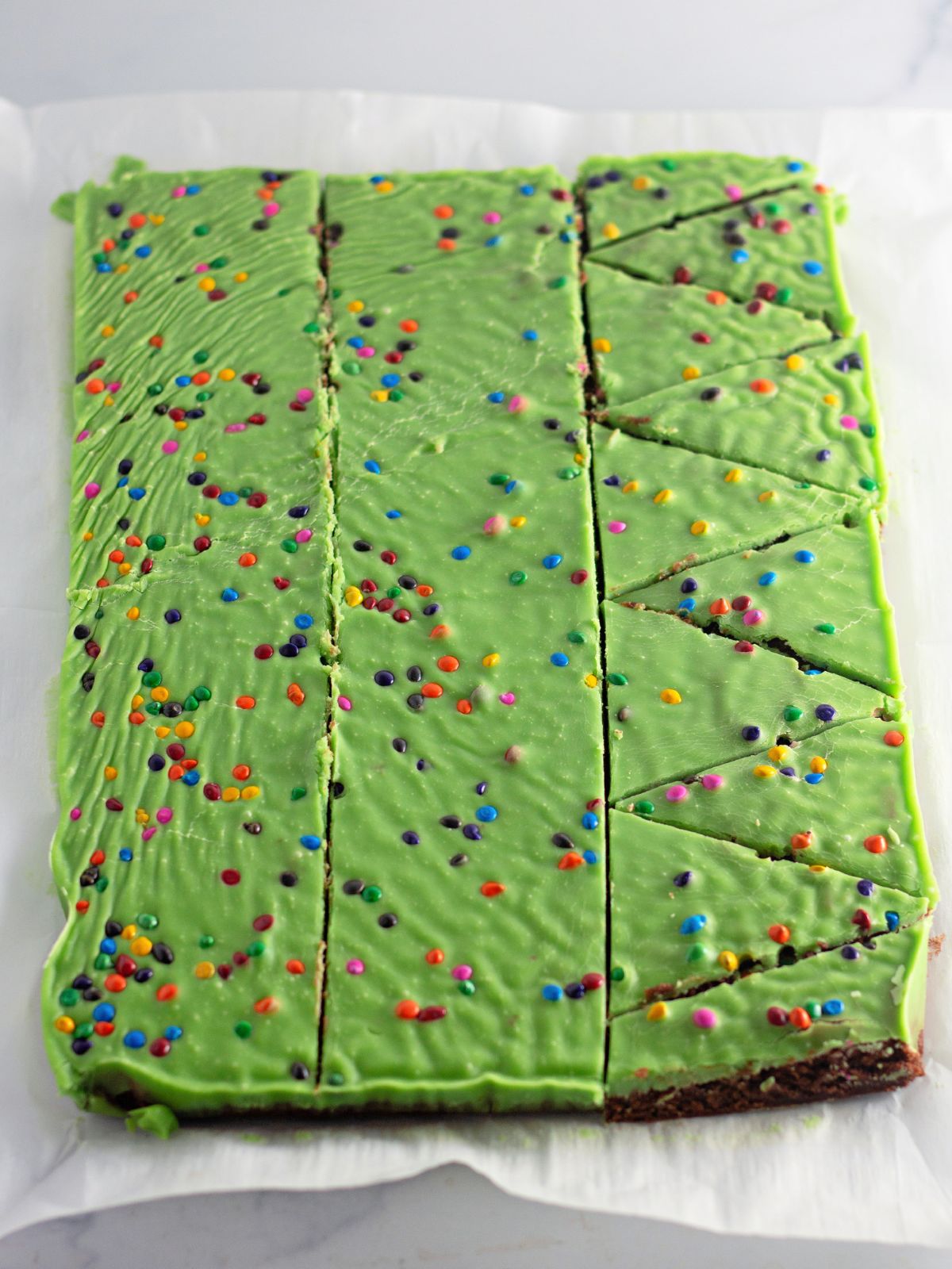 slice Christmas tree shapes in brownies.
