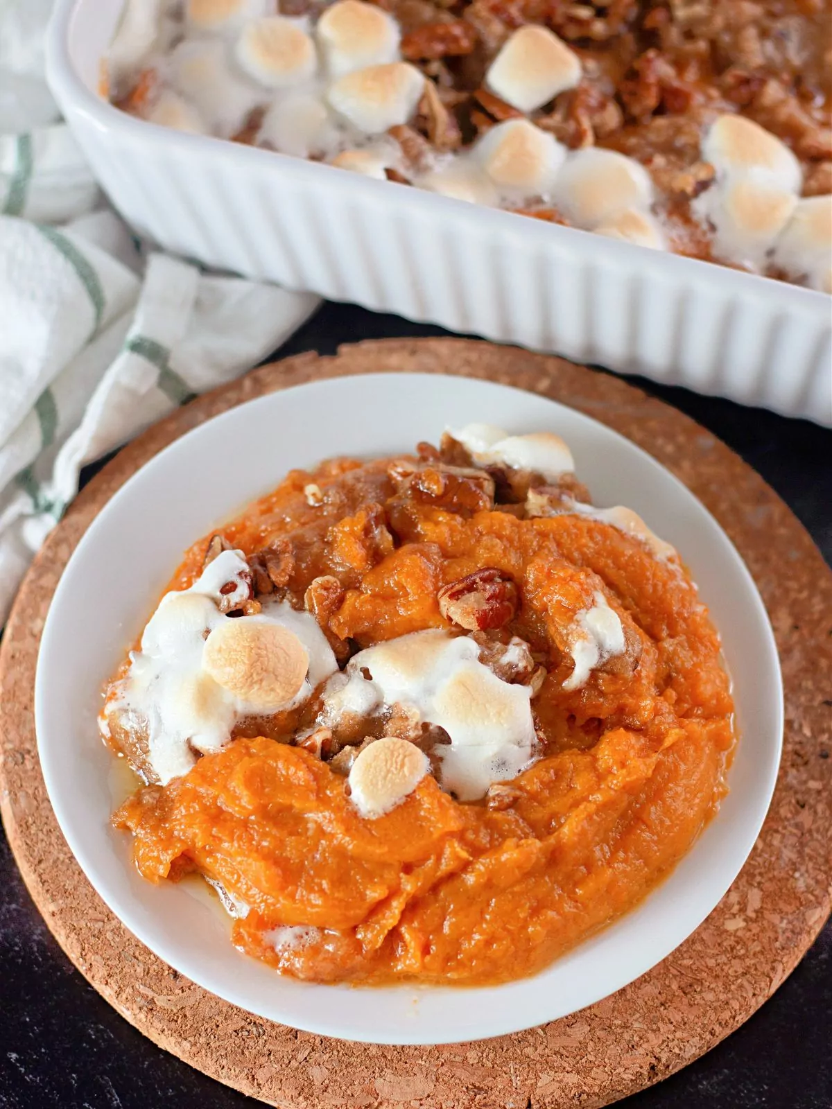 sweet potato casserole with marshmallows served on plate.