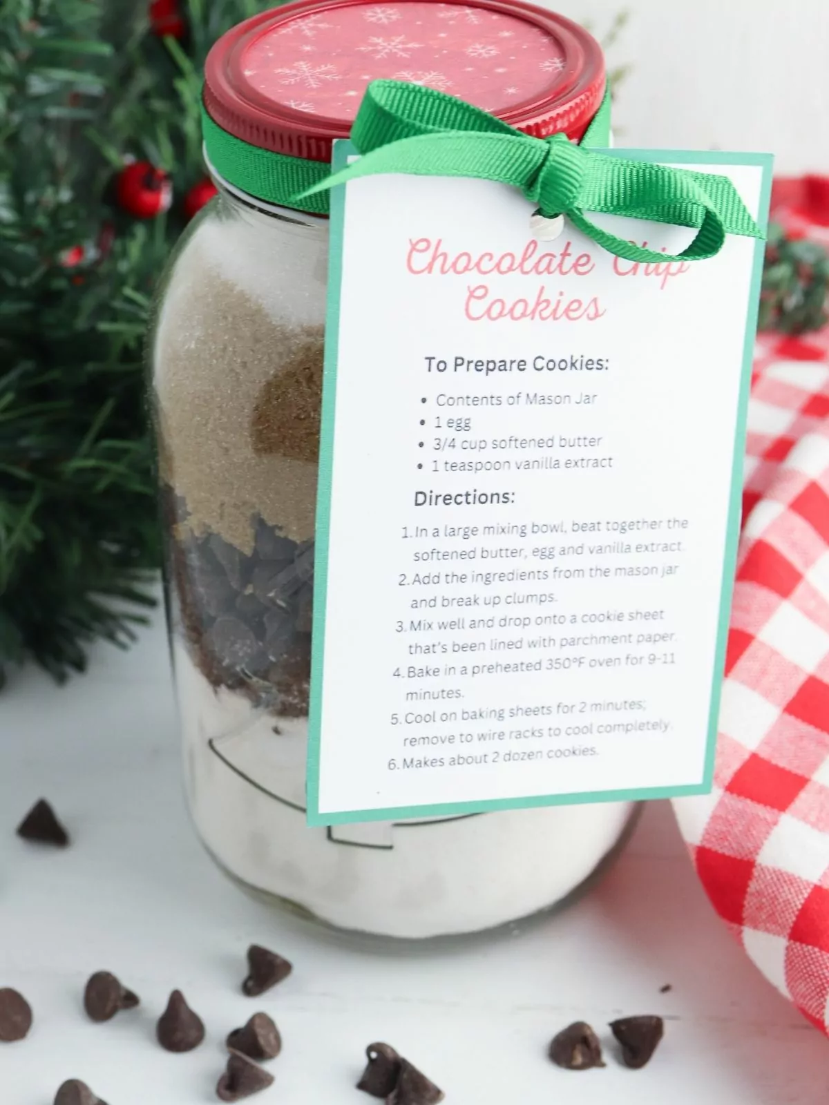 mason jar with cookie ingredients with gift tag attached.