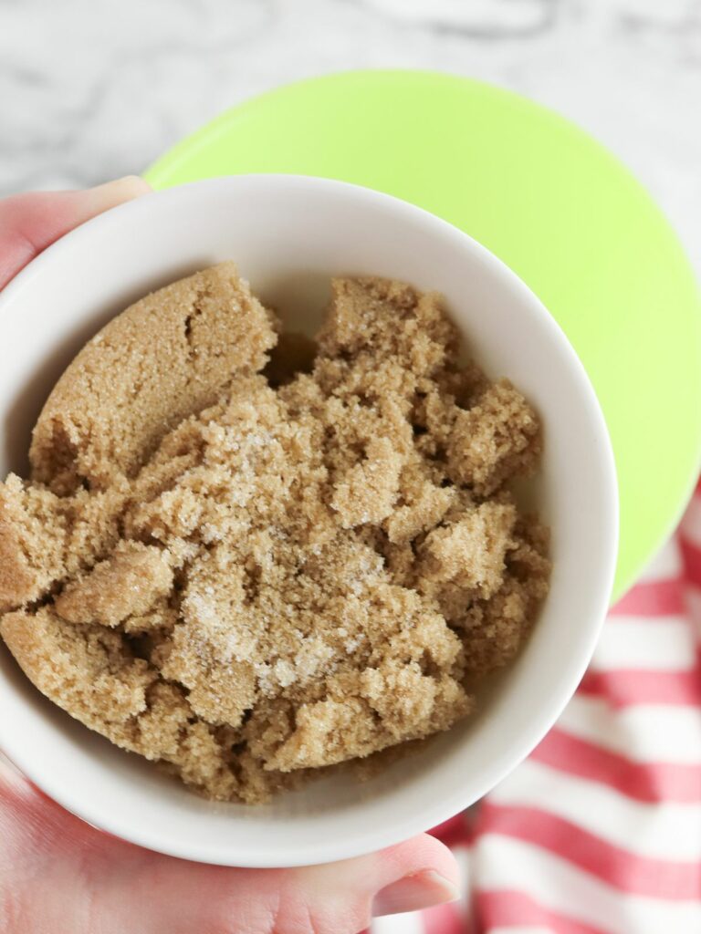 Add brown sugar to mason jar.
