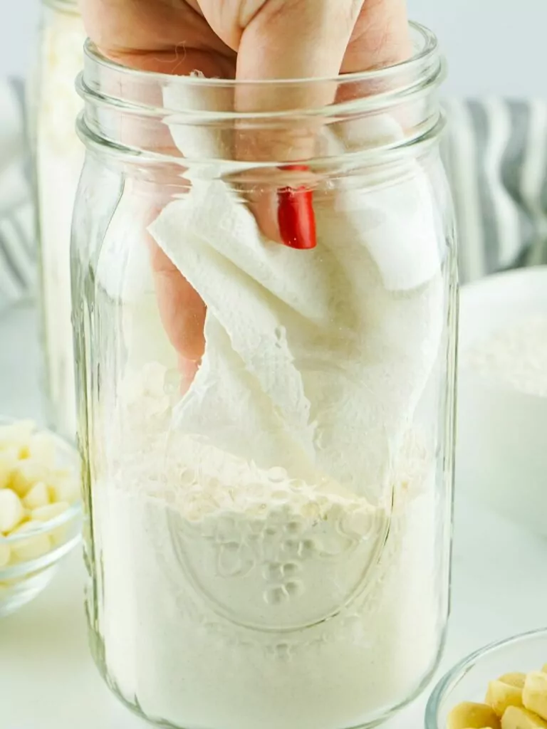use a cloth to clean the mason jar if necessary.