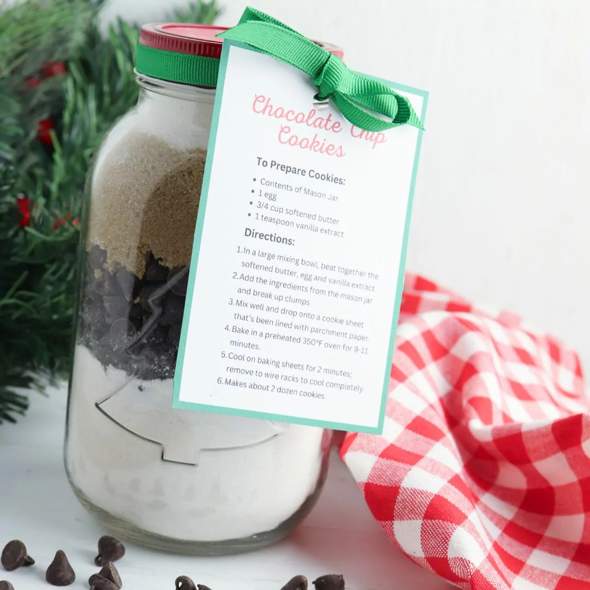 Featured photo mason jar chocolate chip cookies with gift tag.