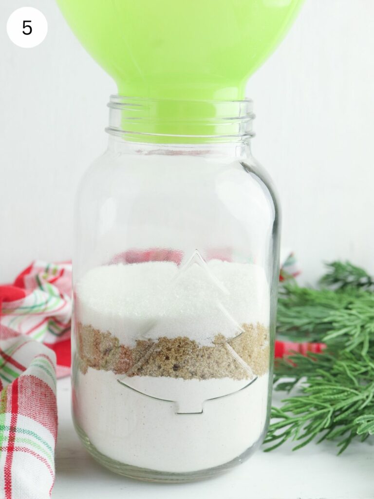 flour, white sugar and brown sugar in mason jar.