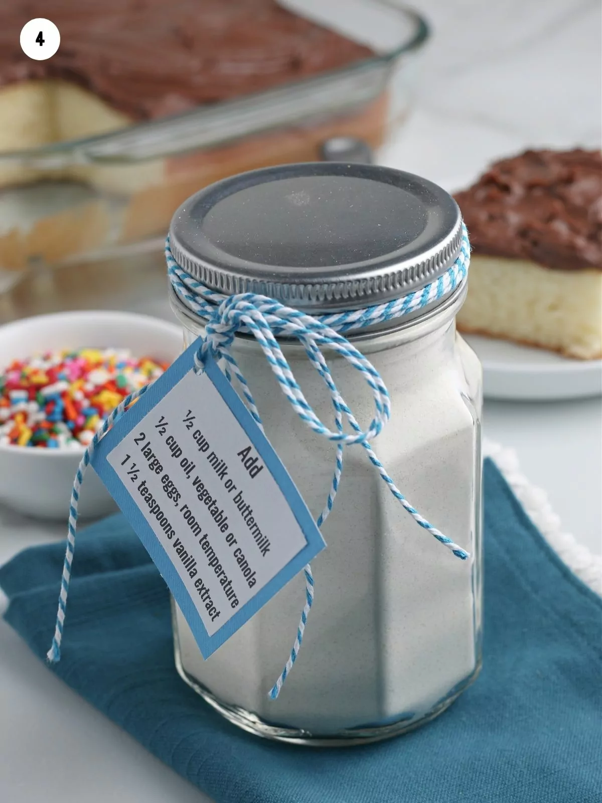 add gift tag to mason jar with cake mix.
