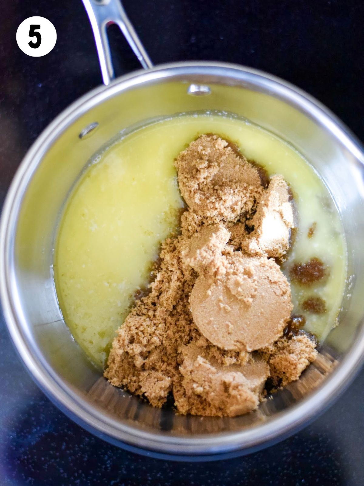brown sugar added to melted butter in saucepan.