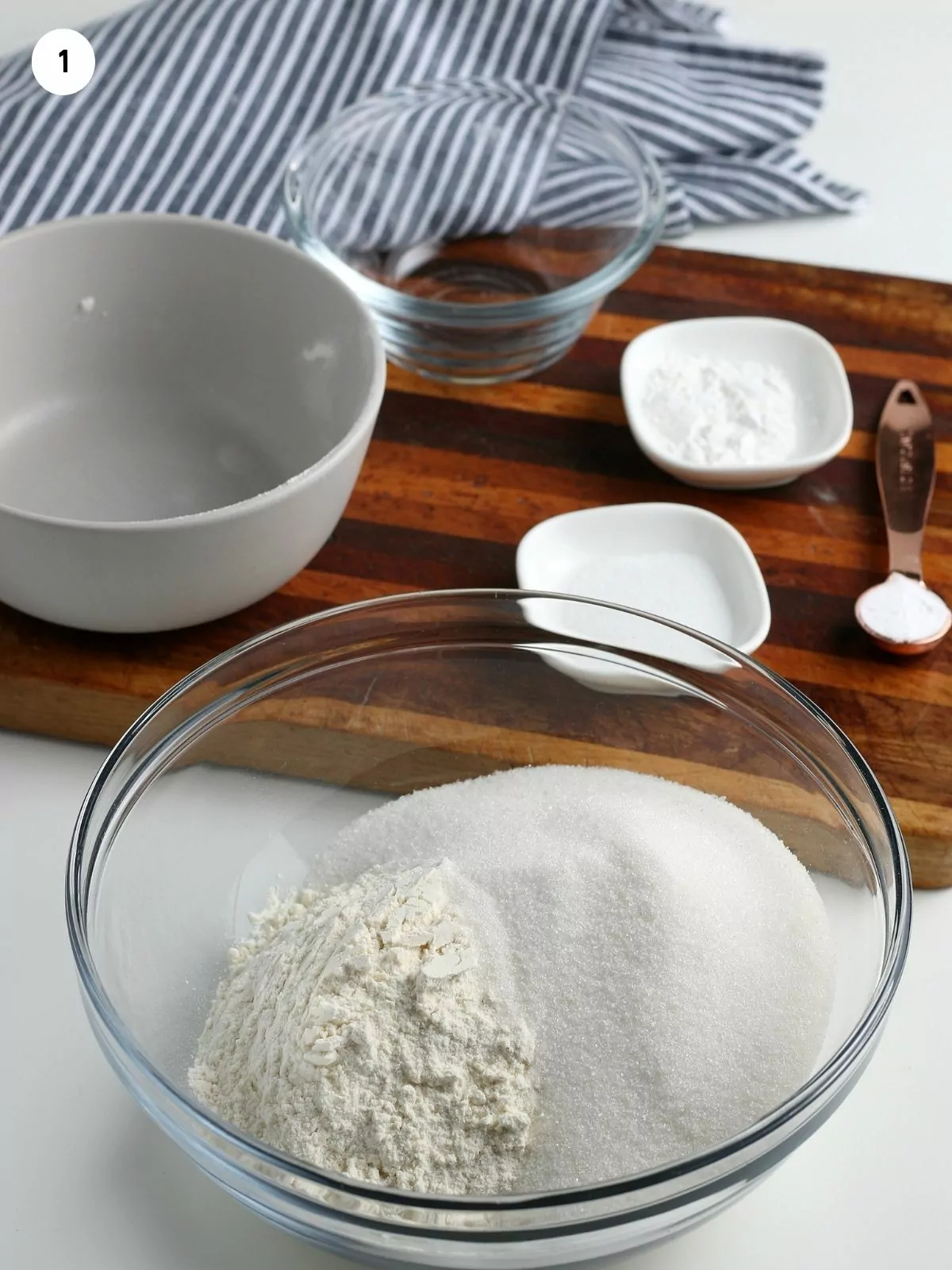 Add flour and sugar in bowl.