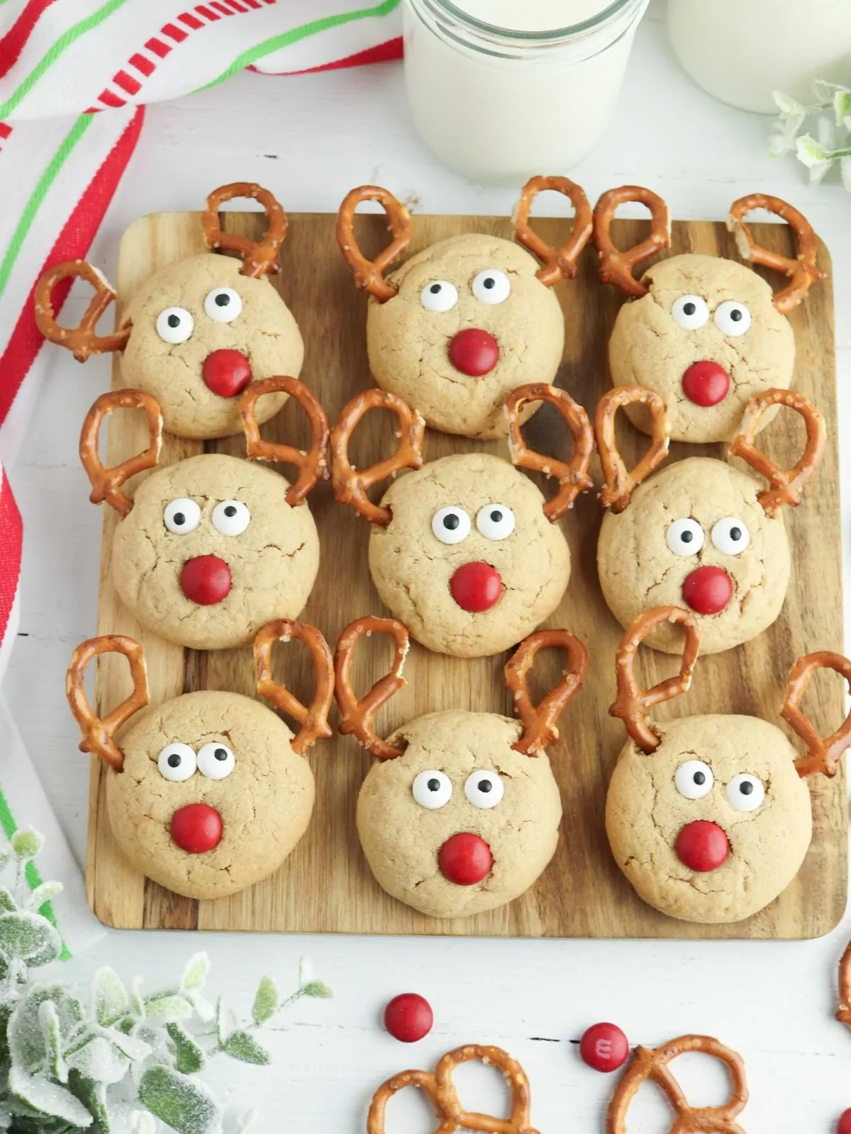 reindeer cookies with pretzel antlers and candy eyes.