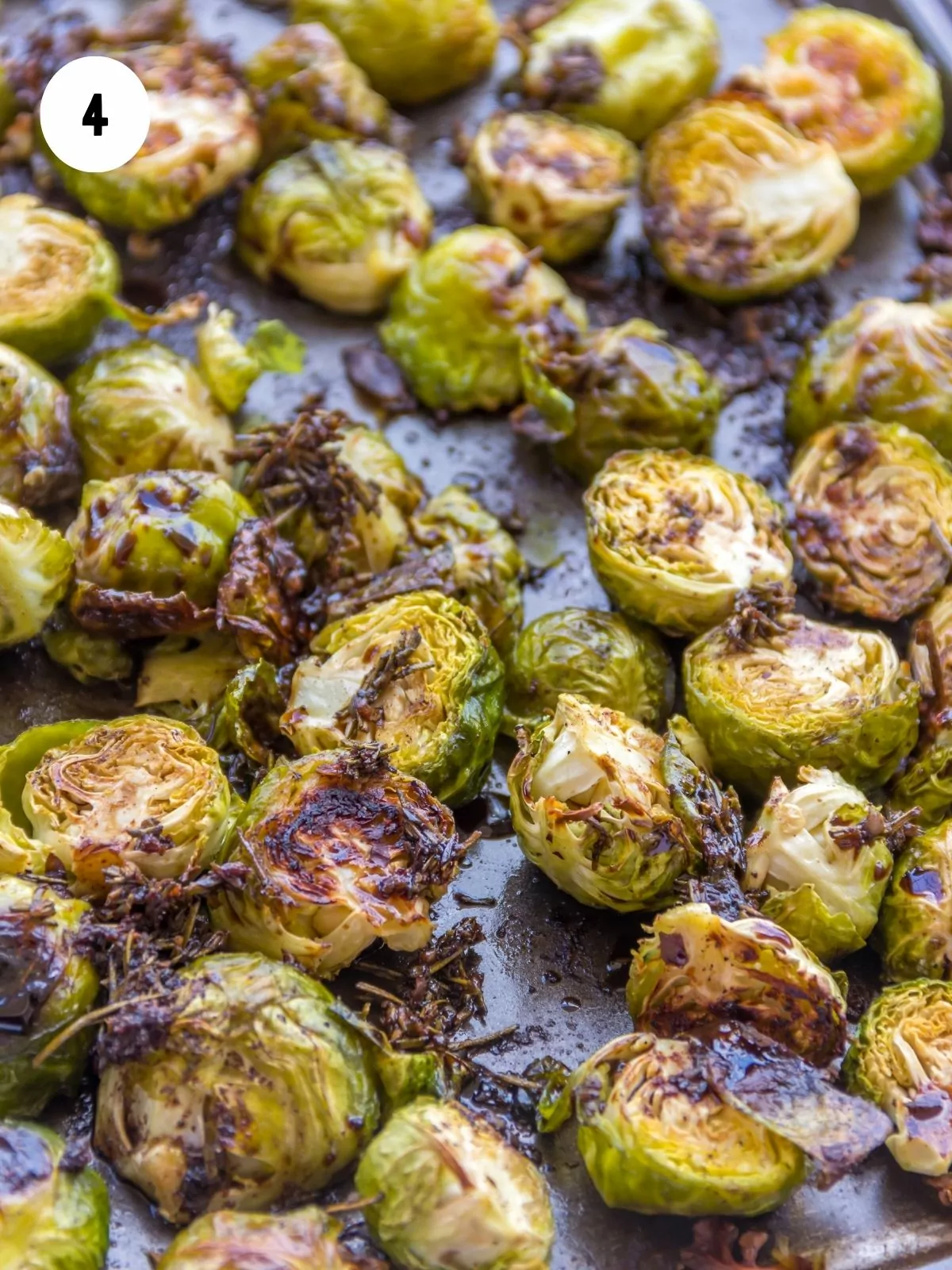 Brussels sprouts roasted on baking tray.