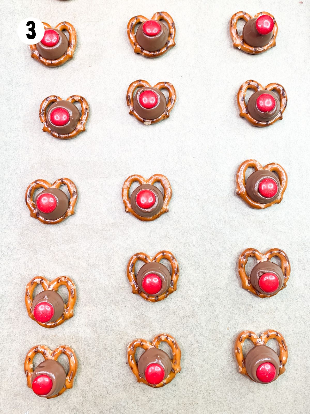 pretzel twists with candy kisses and red M&Ms.