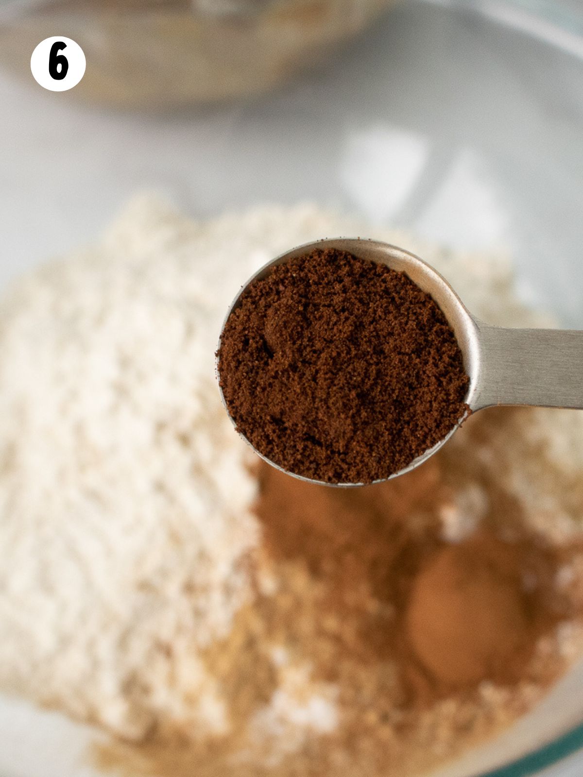 nutmeg in measuring spoon.