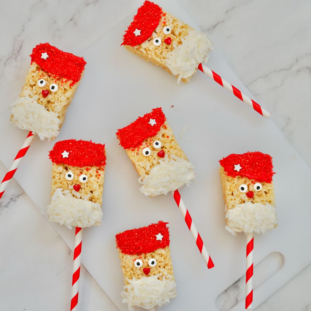 Santa Rice Krispie treats on lollipop sticks.