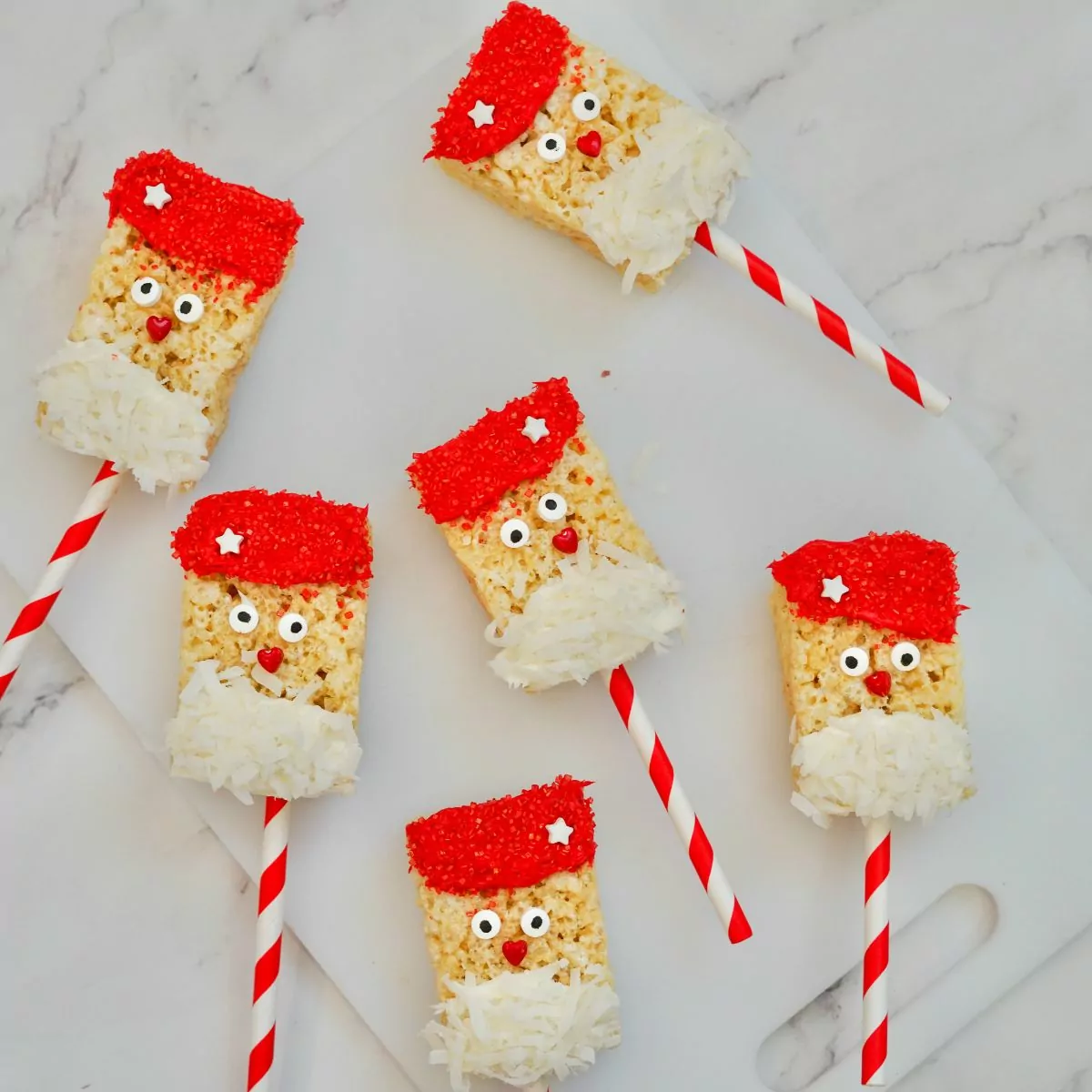 Santa Rice Krispie treats on lollipop sticks.
