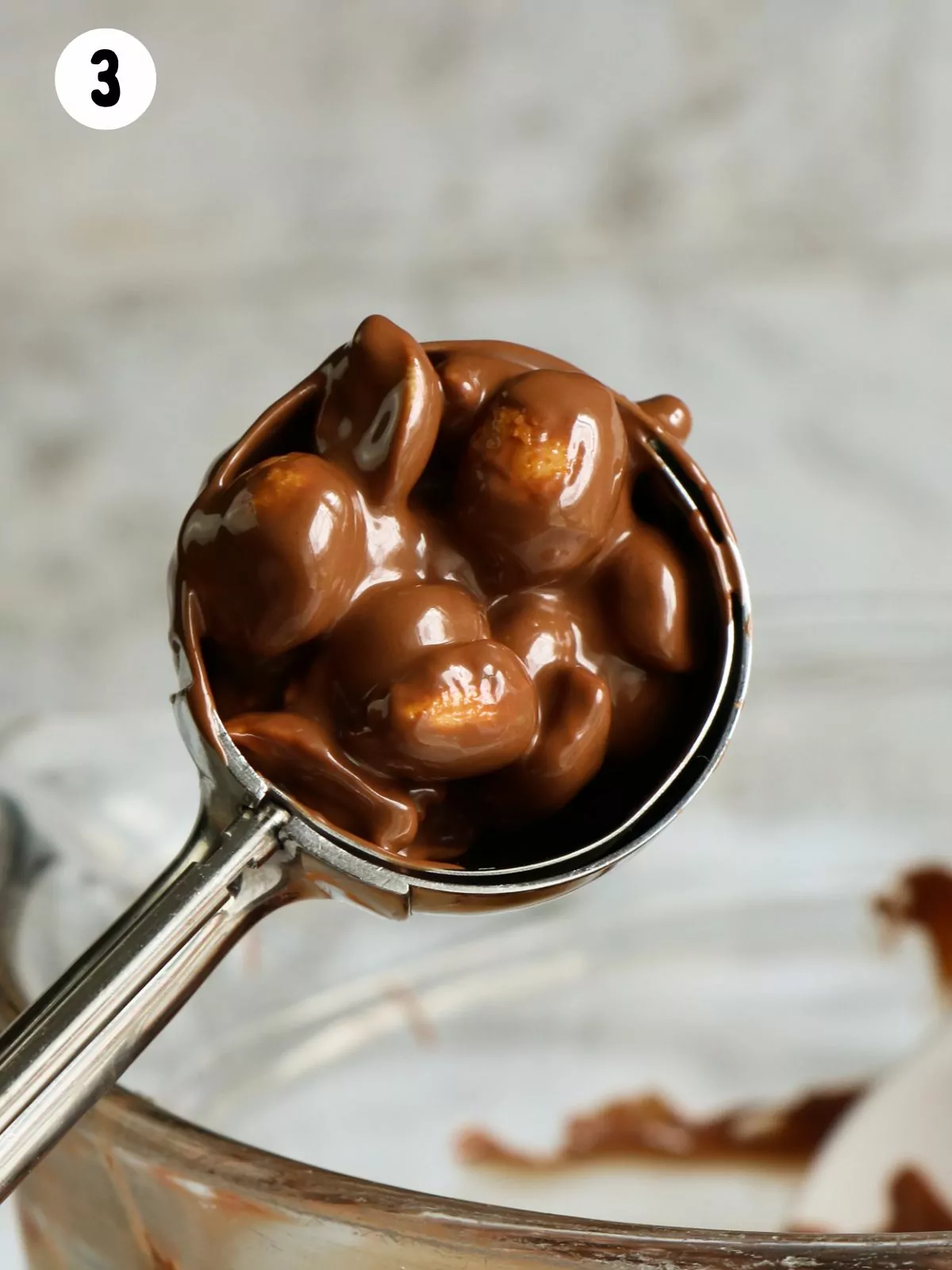 Cookie scoop with diabetic chocolate and peanuts.