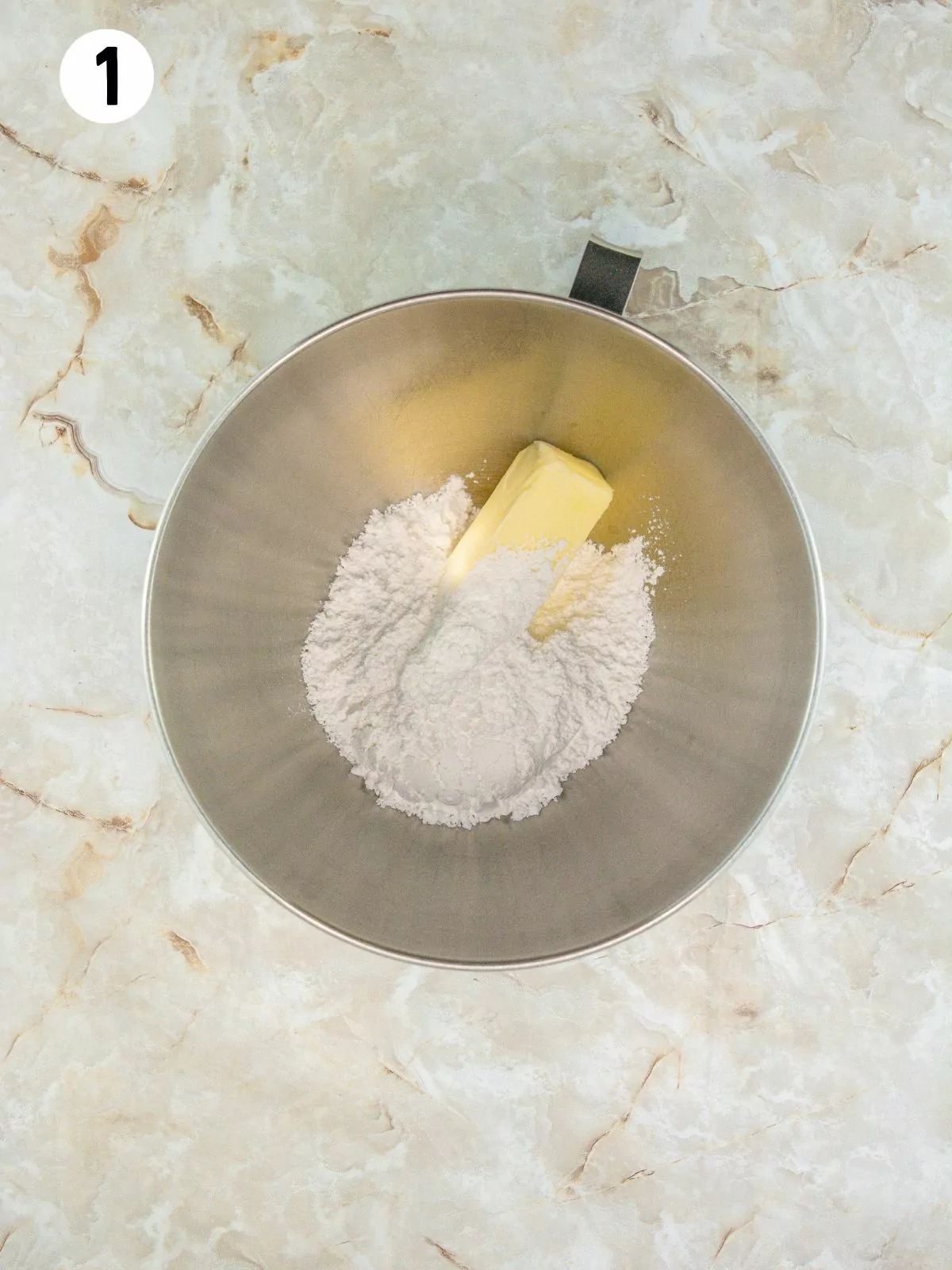 butter and powdered sugar in mixing bowl.