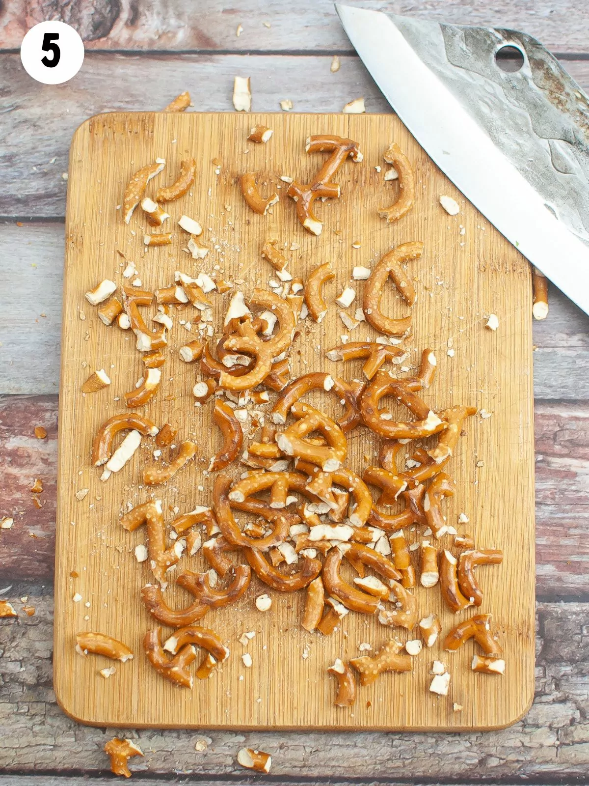 chopped pretzels on cutting board.