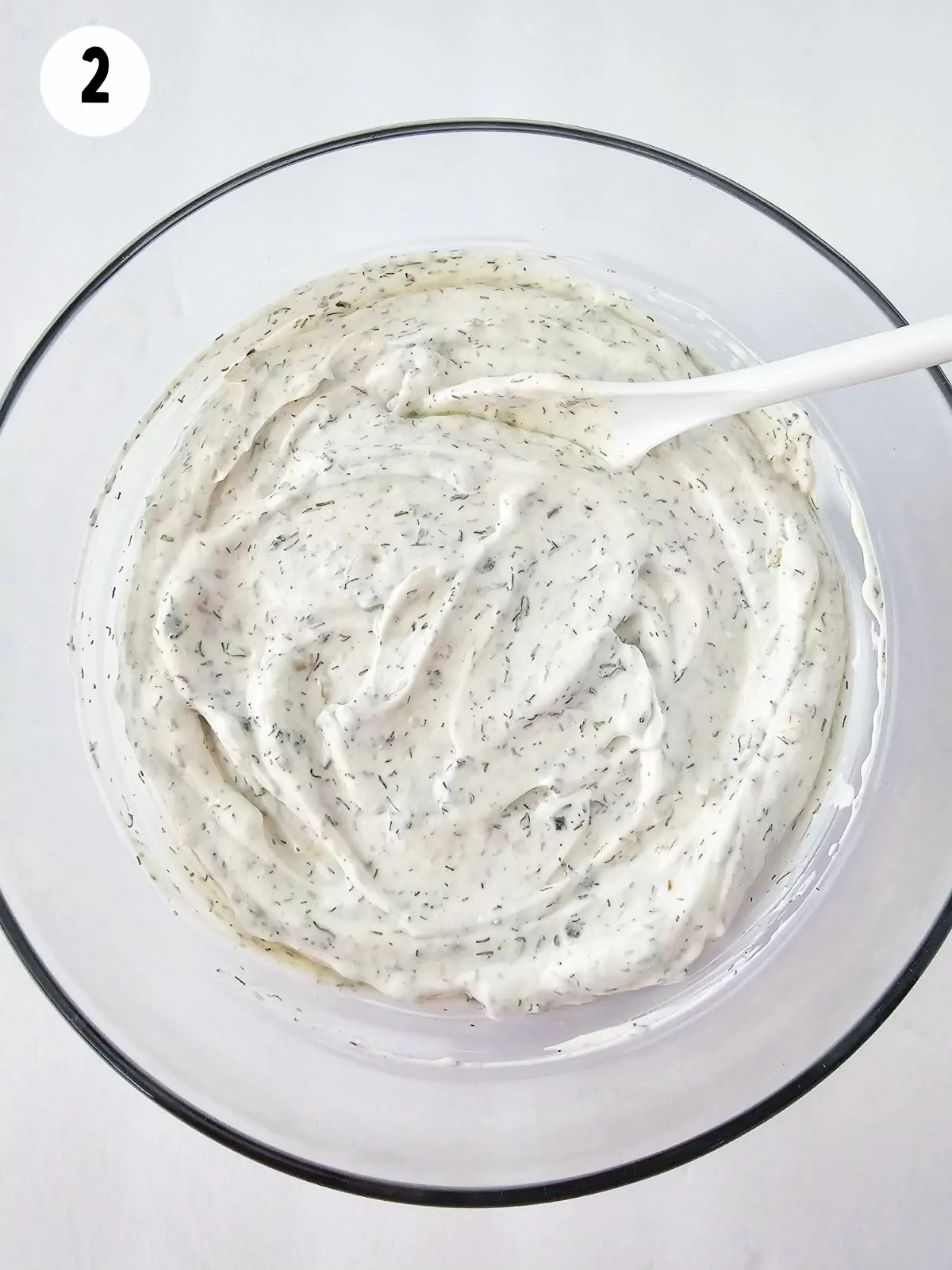 Dill Dip in bowl with spoon.