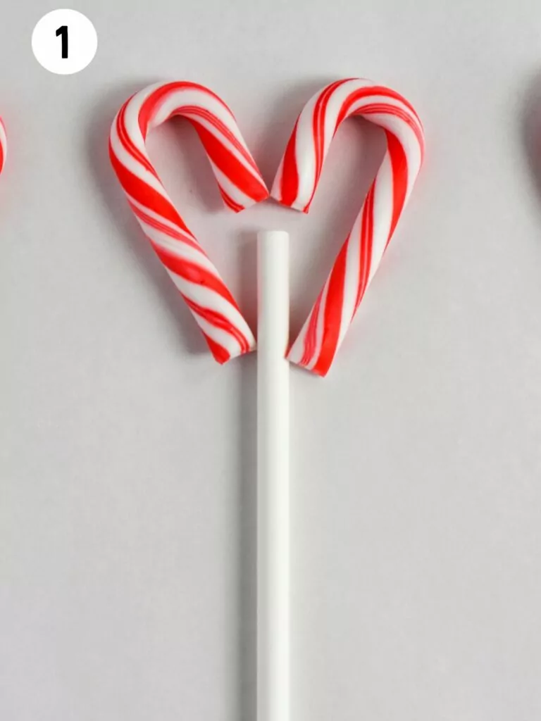 two candy canes forming a heart.