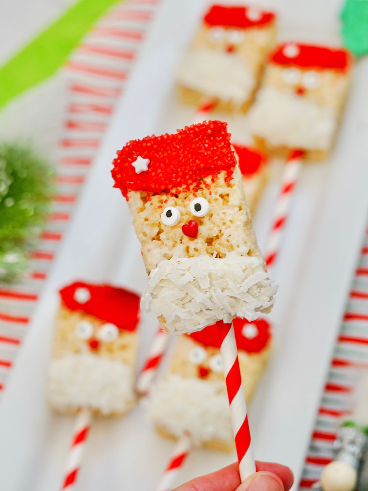 Santa treats on lollipop stick.