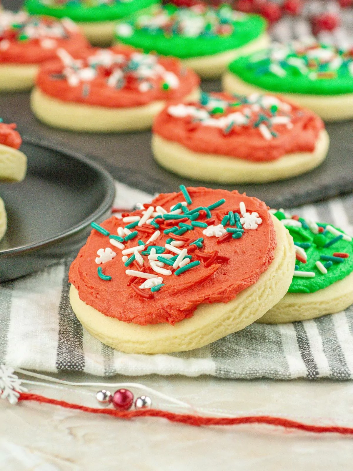 red and green frosted round shaped cookies.