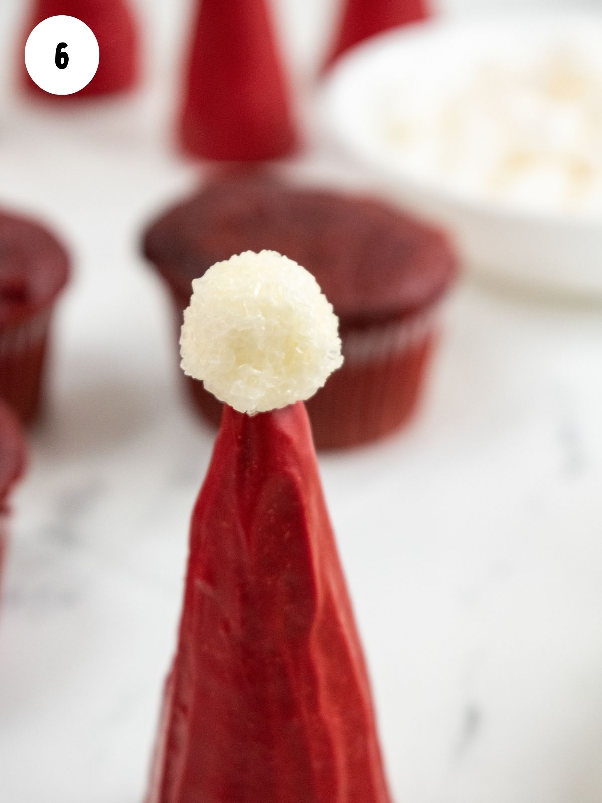 mini marshmallow decorated with cream cheese frosting.