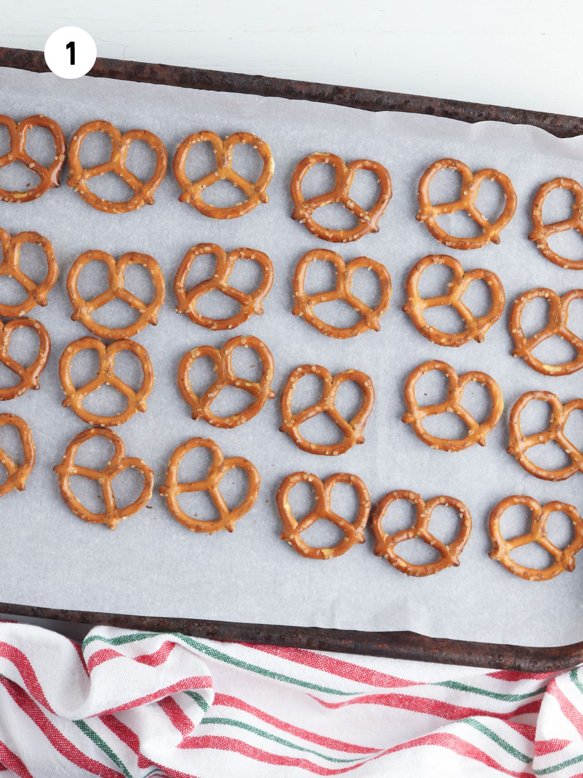 Pretzel twists on baking tray.