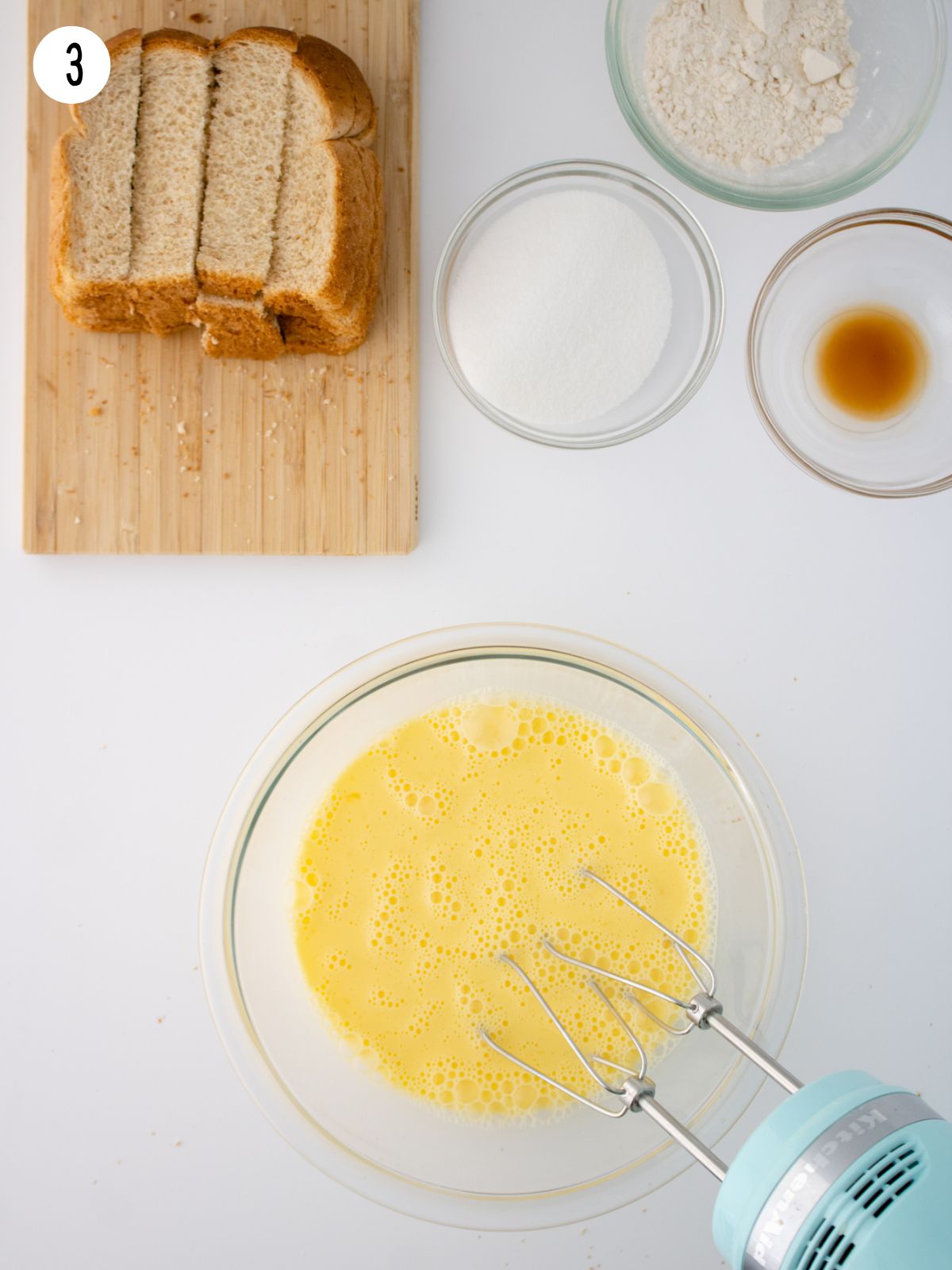 beat eggs with mixer in bowl.