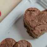 A heart-shaped brownie on a plate.