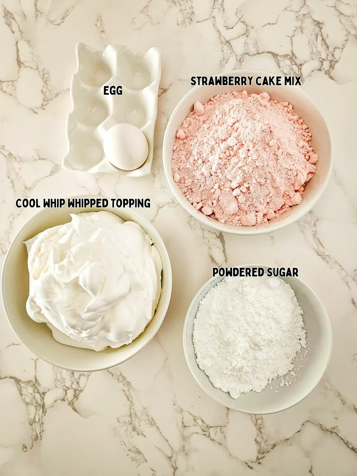 Ingredients in bowls for strawberry crinkle cake mix cookies.