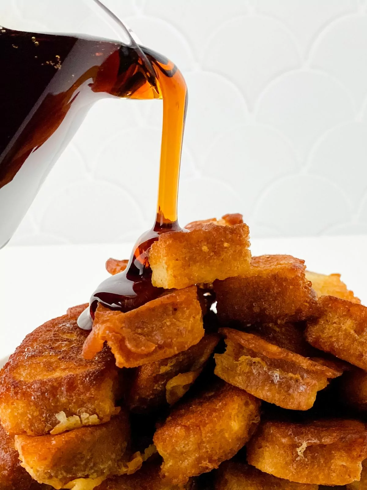 French Toast sticks with syrup.