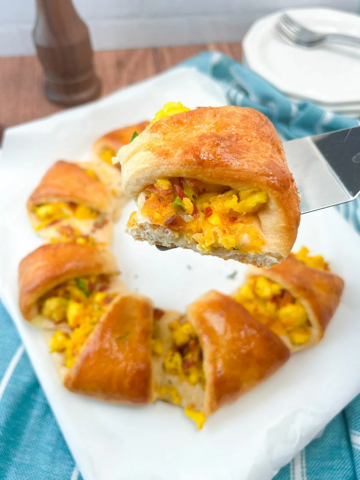 serving crescent rolls filled with eggs and bacon.