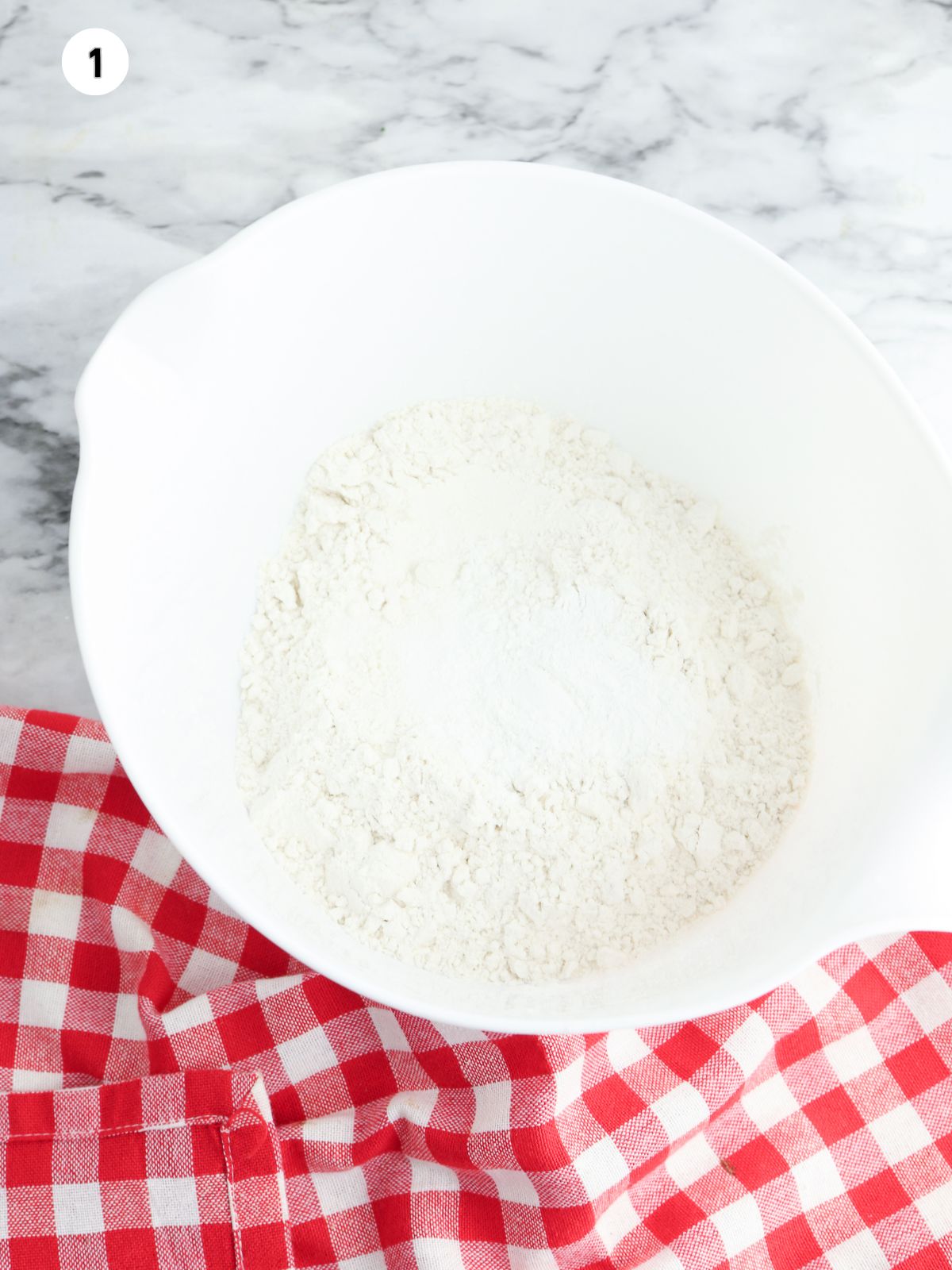 dry ingredients in bowl with milk.
