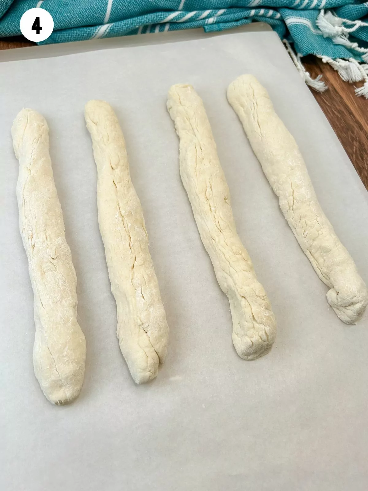 Greek yogurt dough formed into ropes.